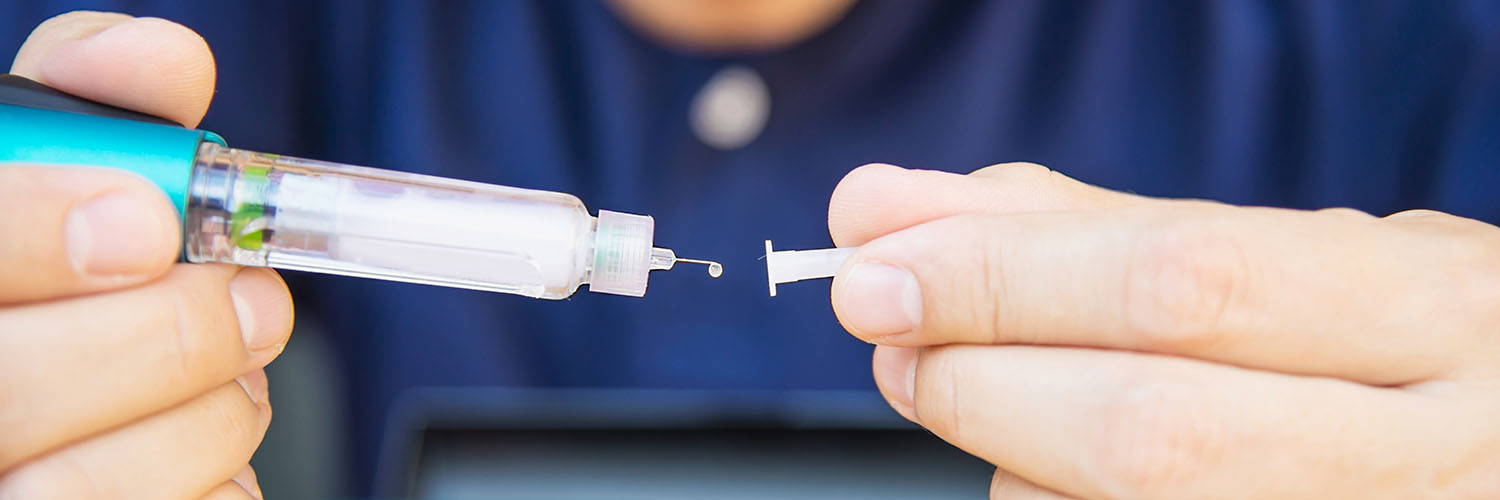 Man injecting insulin